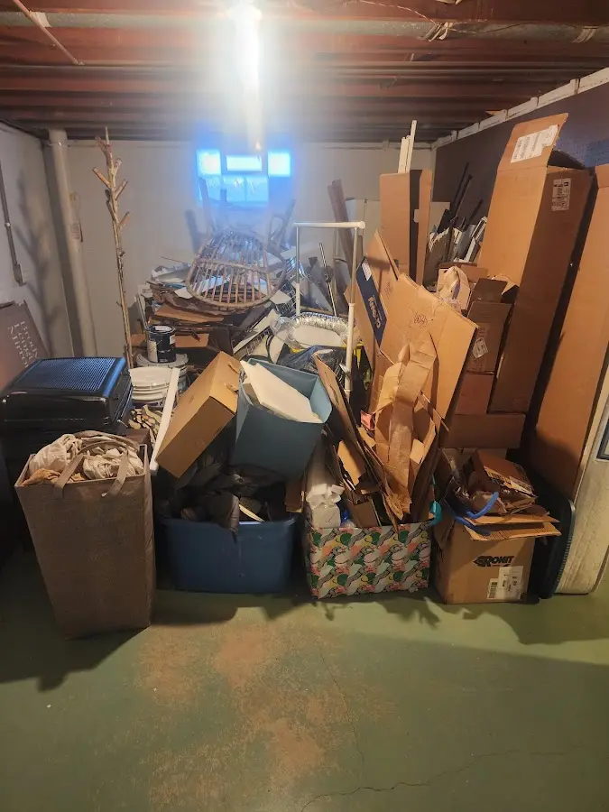 Roll-off dumpster container at job site for 4 Yard Dumpster Rental in Williamstown